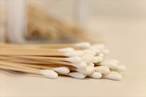 Cotton swab stick for strep throat testing.