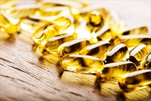 Close-up of fish oil omega 3 gel capsules.