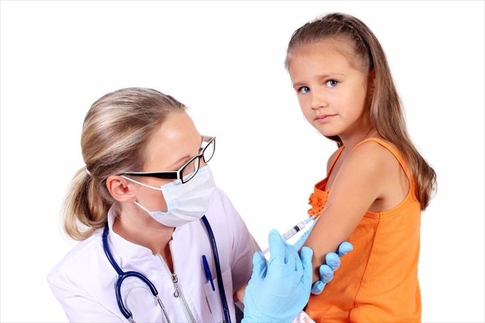 Child getting vaccinated