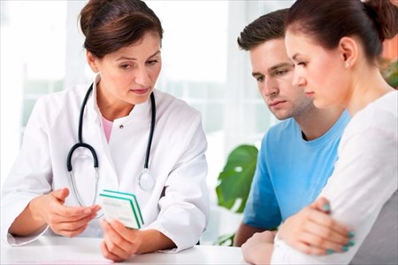 How is infertility diagnosed and treated in women?