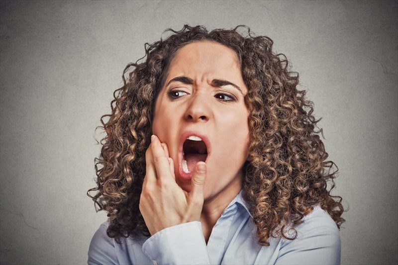 What are the symptoms of periodontitis?