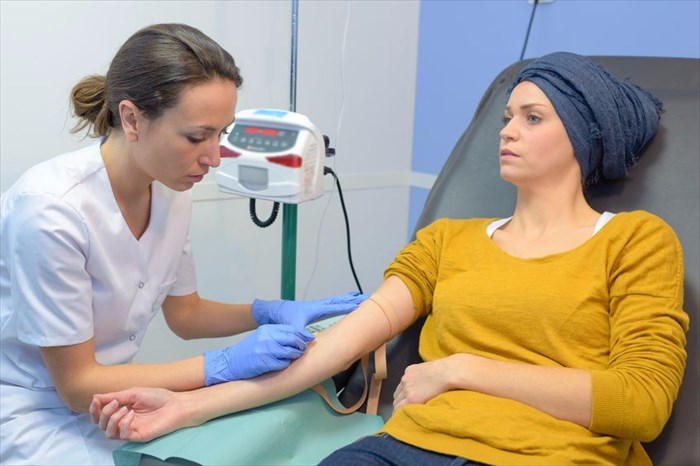 Woman receiving chemotherapy