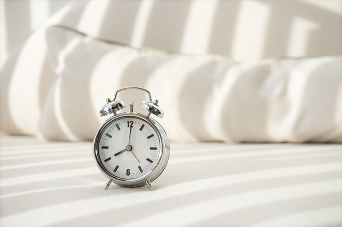 Alarm clock set at a specific time.