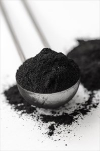 Close-up of activated charcoal powder.