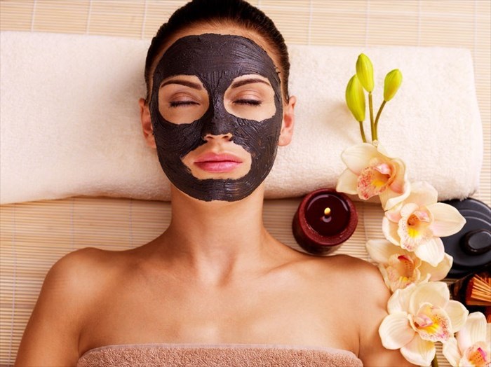 Close up of female face with an applied cosmetic mask.