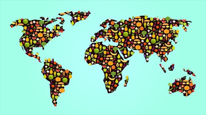 Illustration of the world map with vegetables (food for all)