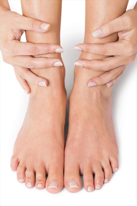 Close-up of healthy fingernails and toenails.