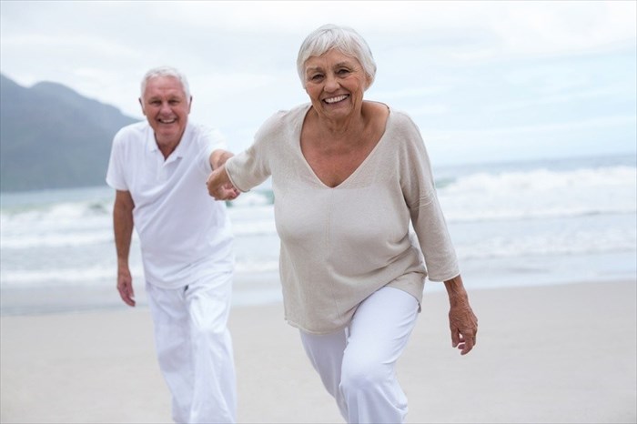 Longevity - old couple on beach