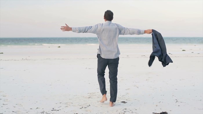 Businessman unwinding in nature