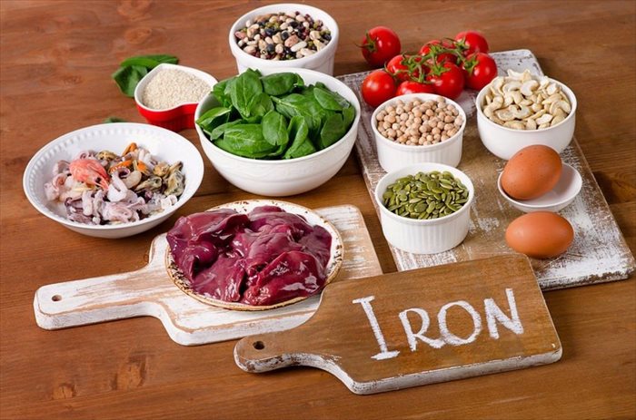 Foods high in Iron, including eggs, nuts, spinach, beans, seafood, liver, sesame, chickpeas, tomatoes