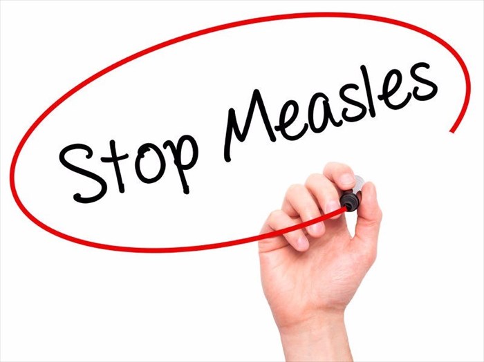 'Stop measles' - prevention awareness sign
